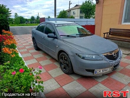 Серый Мазда 6, объемом двигателя 2 л и пробегом 286 тыс. км за 2300 $, фото 1 на Automoto.ua