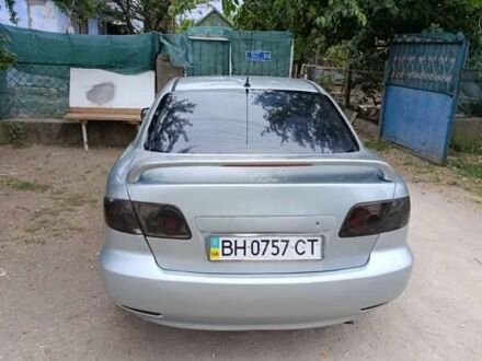 Серый Мазда 6, объемом двигателя 2 л и пробегом 255 тыс. км за 3650 $, фото 1 на Automoto.ua