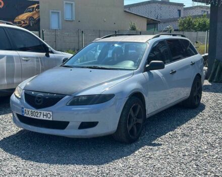 Серый Мазда 6, объемом двигателя 2 л и пробегом 300 тыс. км за 2491 $, фото 1 на Automoto.ua