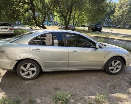 Серый Мазда 6, объемом двигателя 2 л и пробегом 282 тыс. км за 1800 $, фото 1 на Automoto.ua
