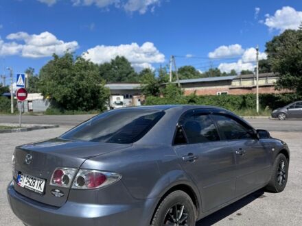 Сірий Мазда 6, об'ємом двигуна 2 л та пробігом 213 тис. км за 3200 $, фото 1 на Automoto.ua