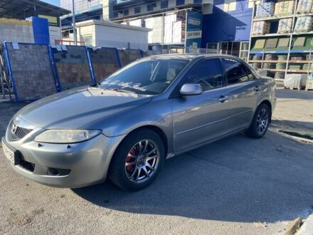 Серый Мазда 6, объемом двигателя 2 л и пробегом 320 тыс. км за 2450 $, фото 1 на Automoto.ua