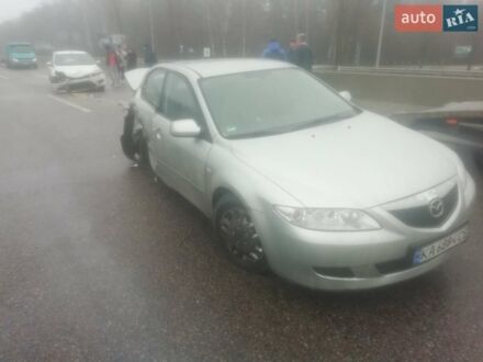 Сірий Мазда 6, об'ємом двигуна 2 л та пробігом 257 тис. км за 1750 $, фото 1 на Automoto.ua