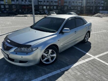 Серый Мазда 6, объемом двигателя 2.3 л и пробегом 300 тыс. км за 4400 $, фото 1 на Automoto.ua