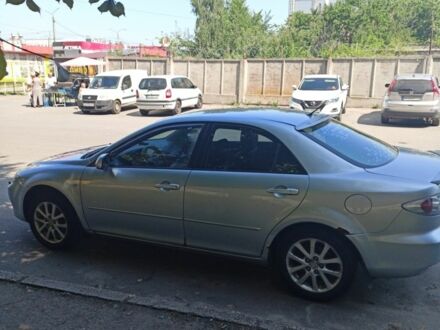 Сірий Мазда 6, об'ємом двигуна 2 л та пробігом 303 тис. км за 3379 $, фото 1 на Automoto.ua