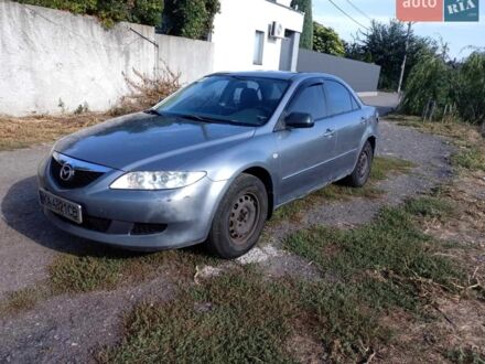 Серый Мазда 6, объемом двигателя 2 л и пробегом 112 тыс. км за 3300 $, фото 1 на Automoto.ua