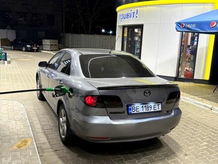 Серый Мазда 6, объемом двигателя 2 л и пробегом 250 тыс. км за 3950 $, фото 1 на Automoto.ua