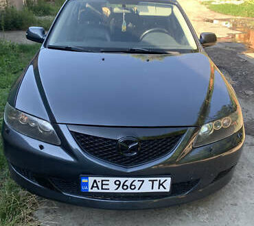 Серый Мазда 6, объемом двигателя 2 л и пробегом 294 тыс. км за 5500 $, фото 1 на Automoto.ua