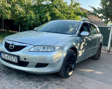 Серый Мазда 6, объемом двигателя 2 л и пробегом 300 тыс. км за 1850 $, фото 1 на Automoto.ua
