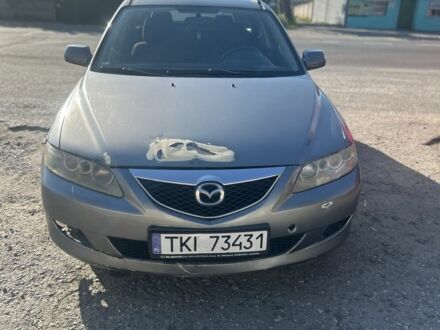 Серый Мазда 6, объемом двигателя 2 л и пробегом 280 тыс. км за 1600 $, фото 1 на Automoto.ua