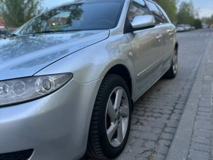 Сірий Мазда 6, об'ємом двигуна 2 л та пробігом 257 тис. км за 3690 $, фото 1 на Automoto.ua