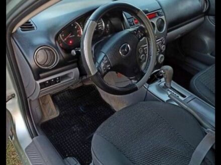 Серый Мазда 6, объемом двигателя 2 л и пробегом 230 тыс. км за 4200 $, фото 1 на Automoto.ua