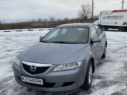 Серый Мазда 6, объемом двигателя 2 л и пробегом 300 тыс. км за 2950 $, фото 1 на Automoto.ua