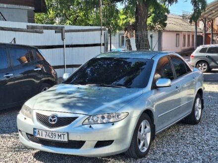 Серый Мазда 6, объемом двигателя 2 л и пробегом 220 тыс. км за 4750 $, фото 1 на Automoto.ua