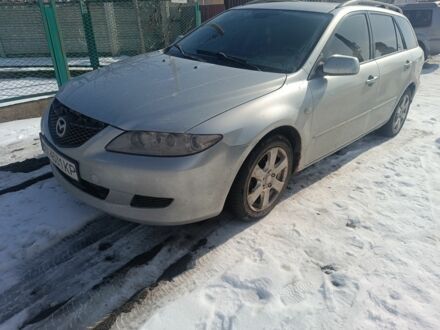 Серый Мазда 6, объемом двигателя 2 л и пробегом 250 тыс. км за 4200 $, фото 1 на Automoto.ua