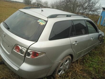 Серый Мазда 6, объемом двигателя 1.8 л и пробегом 200 тыс. км за 1111 $, фото 1 на Automoto.ua