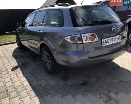 Серый Мазда 6, объемом двигателя 2 л и пробегом 320 тыс. км за 5700 $, фото 1 на Automoto.ua