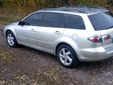 Серый Мазда 6, объемом двигателя 2 л и пробегом 300 тыс. км за 2900 $, фото 1 на Automoto.ua