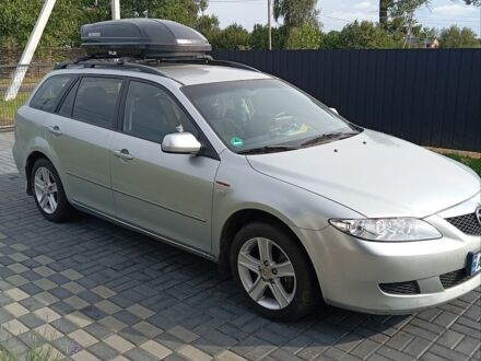 Серый Мазда 6, объемом двигателя 2 л и пробегом 271 тыс. км за 4500 $, фото 1 на Automoto.ua