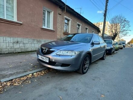 Сірий Мазда 6, об'ємом двигуна 2 л та пробігом 336 тис. км за 2999 $, фото 1 на Automoto.ua