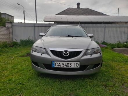 Серый Мазда 6, объемом двигателя 2 л и пробегом 250 тыс. км за 4500 $, фото 1 на Automoto.ua
