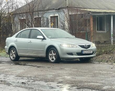 Серый Мазда 6, объемом двигателя 2 л и пробегом 293 тыс. км за 1900 $, фото 1 на Automoto.ua