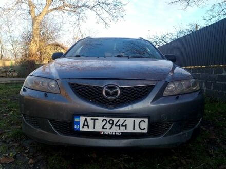 Серый Мазда 6, объемом двигателя 2 л и пробегом 336 тыс. км за 3600 $, фото 1 на Automoto.ua