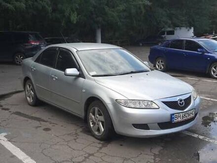 Серый Мазда 6, объемом двигателя 2 л и пробегом 200 тыс. км за 5000 $, фото 1 на Automoto.ua
