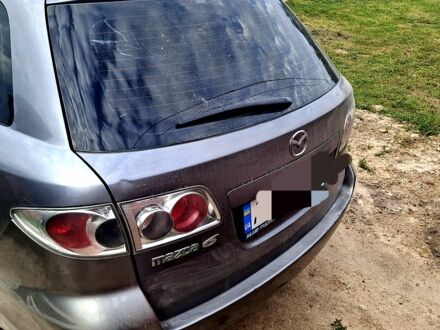 Серый Мазда 6, объемом двигателя 2 л и пробегом 290 тыс. км за 3200 $, фото 1 на Automoto.ua