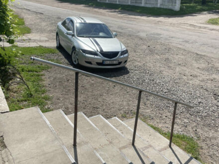 Серый Мазда 6, объемом двигателя 2 л и пробегом 199 тыс. км за 4350 $, фото 1 на Automoto.ua
