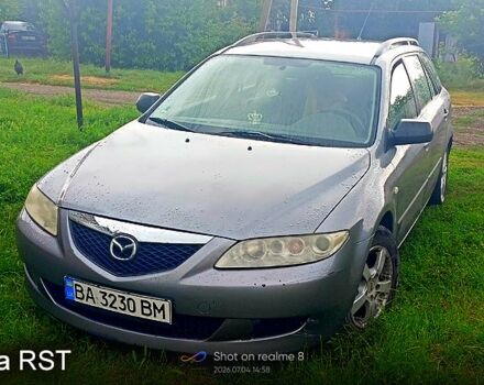 Серый Мазда 6, объемом двигателя 1.8 л и пробегом 251 тыс. км за 2400 $, фото 1 на Automoto.ua