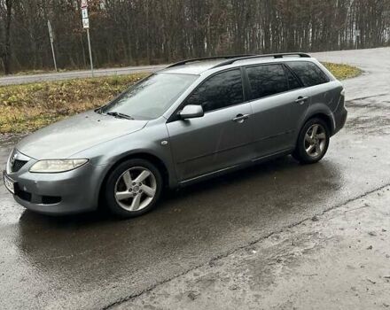 Серый Мазда 6, объемом двигателя 2 л и пробегом 294 тыс. км за 2000 $, фото 1 на Automoto.ua