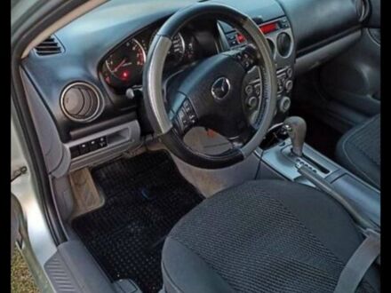 Серый Мазда 6, объемом двигателя 2 л и пробегом 230 тыс. км за 4200 $, фото 1 на Automoto.ua