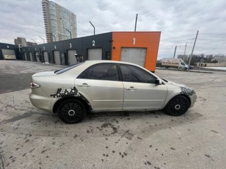 Серый Мазда 6, объемом двигателя 2 л и пробегом 300 тыс. км за 2000 $, фото 1 на Automoto.ua