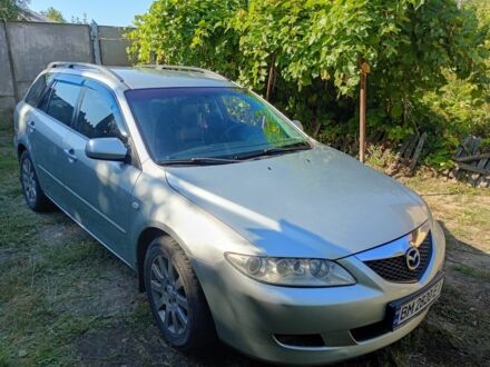 Серый Мазда 6, объемом двигателя 2 л и пробегом 350 тыс. км за 3151 $, фото 1 на Automoto.ua