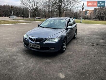 Серый Мазда 6, объемом двигателя 2 л и пробегом 304 тыс. км за 3700 $, фото 1 на Automoto.ua