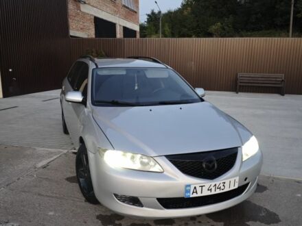 Серый Мазда 6, объемом двигателя 2 л и пробегом 290 тыс. км за 2850 $, фото 1 на Automoto.ua