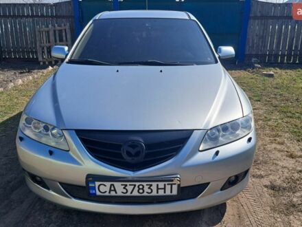 Серый Мазда 6, объемом двигателя 2 л и пробегом 247 тыс. км за 3150 $, фото 1 на Automoto.ua