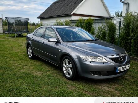Серый Мазда 6, объемом двигателя 2 л и пробегом 325 тыс. км за 2353 $, фото 1 на Automoto.ua