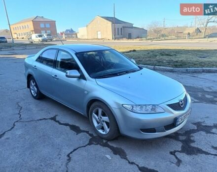 Серый Мазда 6, объемом двигателя 2 л и пробегом 290 тыс. км за 2900 $, фото 1 на Automoto.ua