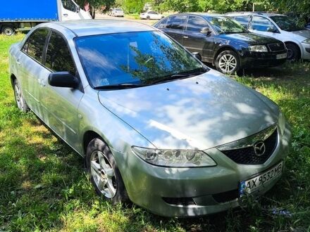 Сірий Мазда 6, об'ємом двигуна 2 л та пробігом 254 тис. км за 3200 $, фото 1 на Automoto.ua