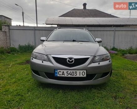 Серый Мазда 6, объемом двигателя 2 л и пробегом 250 тыс. км за 4500 $, фото 1 на Automoto.ua