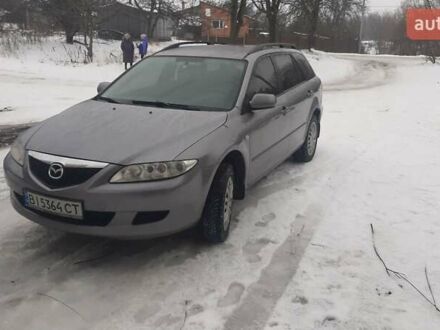 Серый Мазда 6, объемом двигателя 2 л и пробегом 370 тыс. км за 3600 $, фото 1 на Automoto.ua