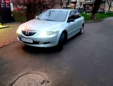 Серый Мазда 6, объемом двигателя 2 л и пробегом 211 тыс. км за 4200 $, фото 1 на Automoto.ua