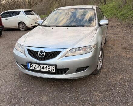 Серый Мазда 6, объемом двигателя 2 л и пробегом 300 тыс. км за 2150 $, фото 1 на Automoto.ua