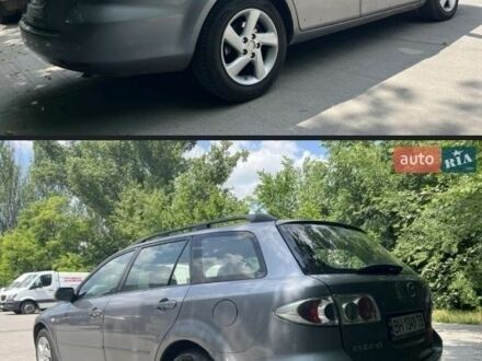 Серый Мазда 6, объемом двигателя 2 л и пробегом 300 тыс. км за 3001 $, фото 1 на Automoto.ua