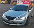 Серый Мазда 6, объемом двигателя 2 л и пробегом 250 тыс. км за 4575 $, фото 1 на Automoto.ua