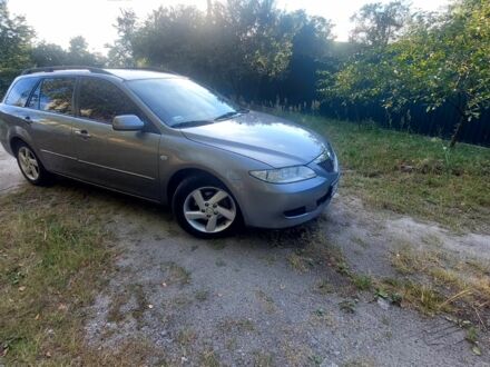 Сірий Мазда 6, об'ємом двигуна 2 л та пробігом 585 тис. км за 3400 $, фото 1 на Automoto.ua