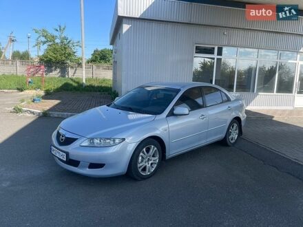 Сірий Мазда 6, об'ємом двигуна 2 л та пробігом 447 тис. км за 2950 $, фото 1 на Automoto.ua