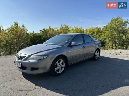 Серый Мазда 6, объемом двигателя 2 л и пробегом 350 тыс. км за 4200 $, фото 1 на Automoto.ua